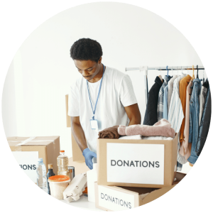 man standing with donations box for charity