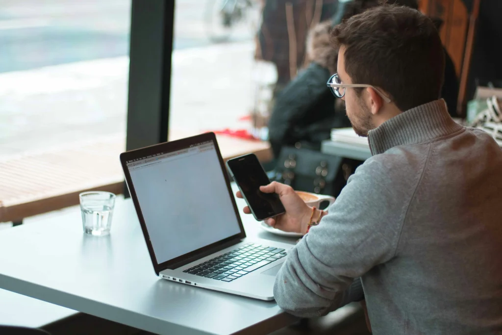 Business owner checking laptop